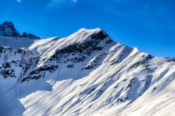 Fototapeta na wymiar Dolomites mountains range covered with snow.