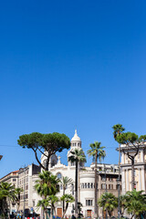 ROME, ITALY - 2014 AUGUST 18. Street photo of green trees and architecture buildings in Rome.