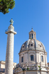 ROME, ITALY - 2014 AUGUST 18. The church Most Holy Name of Mary in Rome, and Trajan's Column.