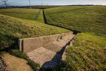 Drain system on green field at the underground storage center of radioactive waste in Cherbourg,...
