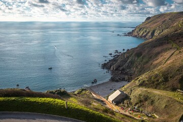 Beautiful coastline of Normandy, high shore and wonderful blue sea with light ripple in its surface. France.