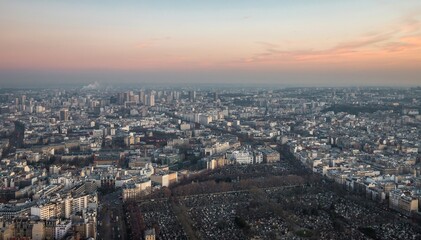 Aerial view of Paris cityscape -  roads, streets and buildings and the Montparnasse Cemetery, the...