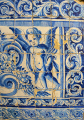 Ornamental old typical tiles from Portugal called "azulejos" made with colored ceramic tiles, who decorates the houses in Lisbon, Portugal
