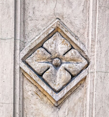 Traditional bas relief decoration on building facade. 