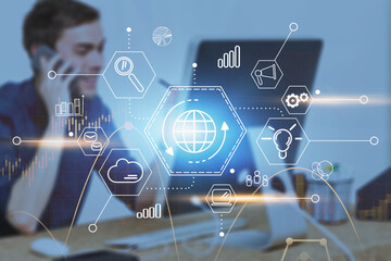 Man on phone in office, cloud computing interface