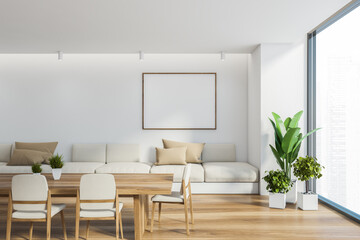 White dining room interior with poster