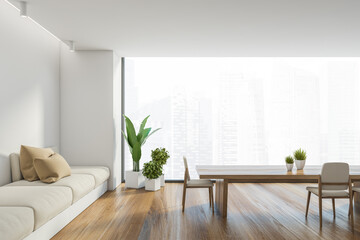 Panoramic white dining room interior with sofa