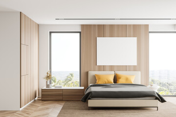 White and wooden bedroom with poster