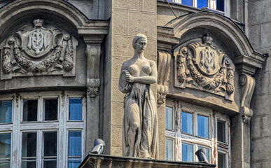 Obraz premium Bas relief traditional decorative composition at urban building in Belgrade, Serbia.
