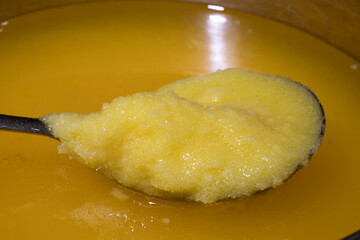 Spoon full of organic Ghe   