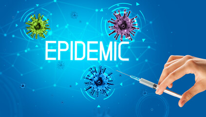 Obraz na płótnie Canvas Syringe, medical injection in hand with EPIDEMIC inscription, coronavirus vaccine concept