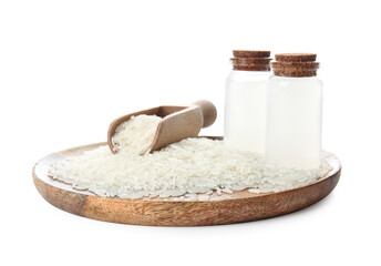 Bottles of rice water on white background