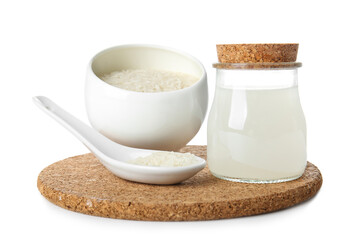 Jar of rice water on white background