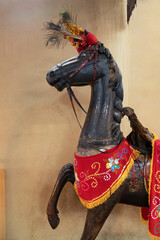Obraz premium antique wooden horse artifact in asian buddhist temple