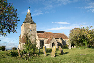 St Mary in the Marsh is an Anglican Church in New Romney - Kent. It has a traditional clock tower...