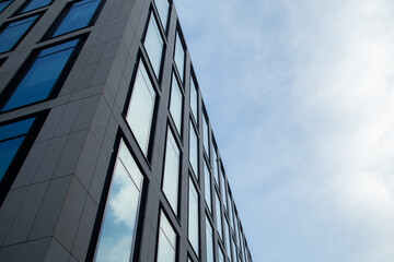 Fototapeta na wymiar Modern office building with blue sky