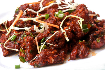 Paneer Tikka Kabab in red sauce - is an Indian dish made from chunks of cottage cheese marinated in spices ,chilli Paneer Kabab, Paneer 65,Spicy cottage cheese
