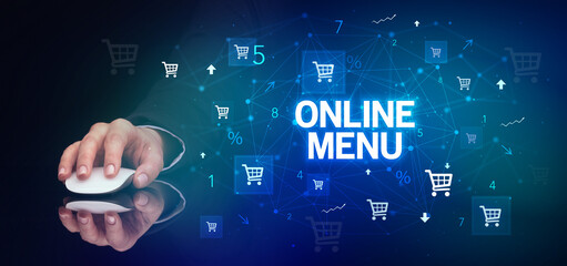 hand holding wireless peripheral with ONLINE MENU inscription, online shopping concept