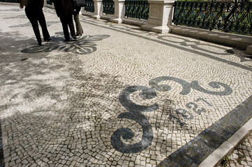 calcada on the terrace of the Miradouro de Sao Pedro de Alcântara in Lisbon - obrazy, fototapety, plakaty