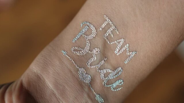 silver team bride stamp on wrist bachelorette party
