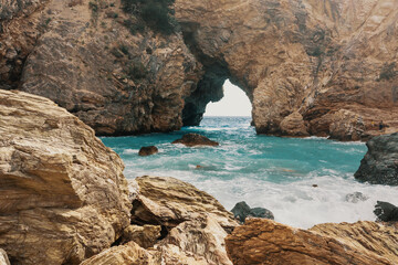 Fototapeta premium Sea Caves Turkey. The coast of the Mediterranean Sea. At the foot of Mount. Cruise over sea.
