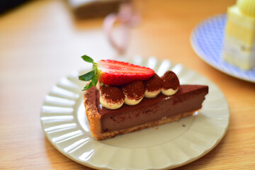 People eating dessert in coffee.