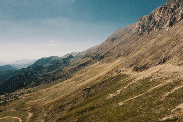 Fototapeta premium Aerial view of a path leading to an impressive mountain landscape in Turkey. Picturesque view