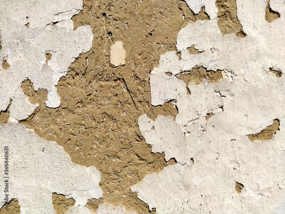 Poster close-up background of the wall of an old house made of clay mixed with straw. old type of construct
