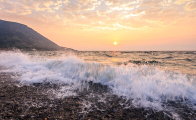 Amazing sunrise landscape at Baikal lake, Irkutsk region, Russia, big Baikal trail, cape Kadilnyy