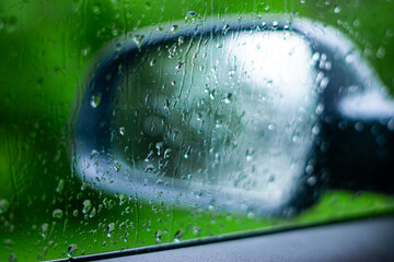 wet car wing mirror
