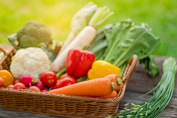 Vegetables basket on wood background
