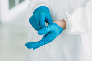 Fototapeta premium Lab Technician in Personal protective equipment PPE suit Vaccines testing of Virus