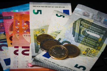 euro banknotes and coins
