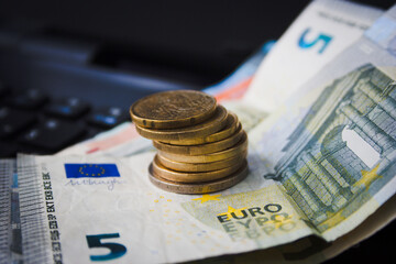 euro banknotes and coins