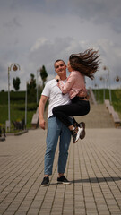 Kissing couple, portrait of man and woman in park