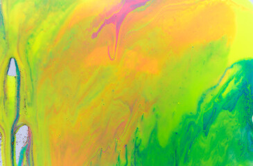 Neon colored marble pattern with golden glitter. Fluorescent liquid background. Artwork abstract bright texture.