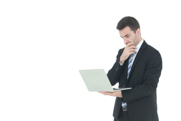 Successful and handsome  businessman in a suit smiling with hand holding notebook. He serious in working on a laptop isolated on white background. Copy space