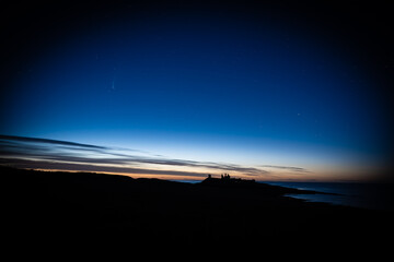 Neowise Comet over Dunstanburgh Castle, Northumberland.