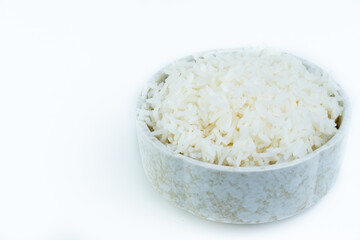 Rice in a cup is isolated.
