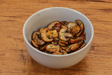 Roasted champignon with herbs and spices