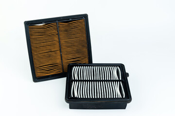 Close up dirty car air conditioner filter isolated on white - deep focus image.