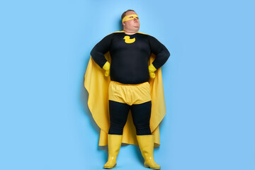 serious overweight super hero man is defender of the universe, strong guy has a mad desire, a dream...