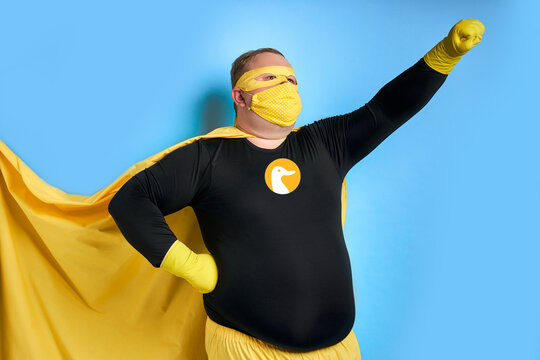 let's save the planet from dirt portrait of cleaning fat man in yellow costume isolated over blue background