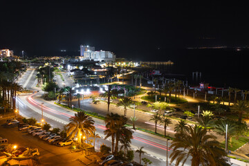 Fototapeta na wymiar Evening view of the resort city of Ein Bokek on the Dead Sea in Israel
