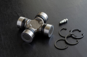 Cross joint for propeller shaft and set of circlips.