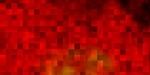 Fototapeta premium Light Orange vector backdrop with rectangles.