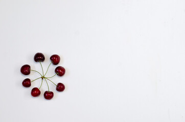 Ripe cherry berries isolated on white background. Berry summer background. Flat lay, concept, copy space