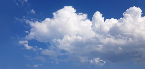 Naklejka na ściany i meble Skyline. Blue sky clouds background. Beautiful day landscape