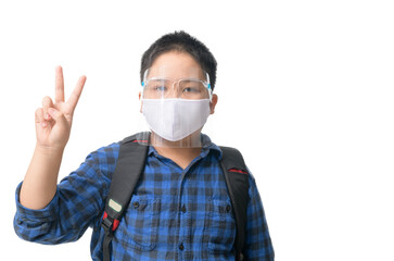 Asian student boy wear face shield and mask  against infectious Virus and show victory sign hands isolated on white. coronavirus outbreak isolated on white. Covid19, New normal and Healthcare concept.