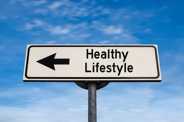 Healthy lifestyle road sign, arrow on blue sky background. One way blank road sign with copy space....